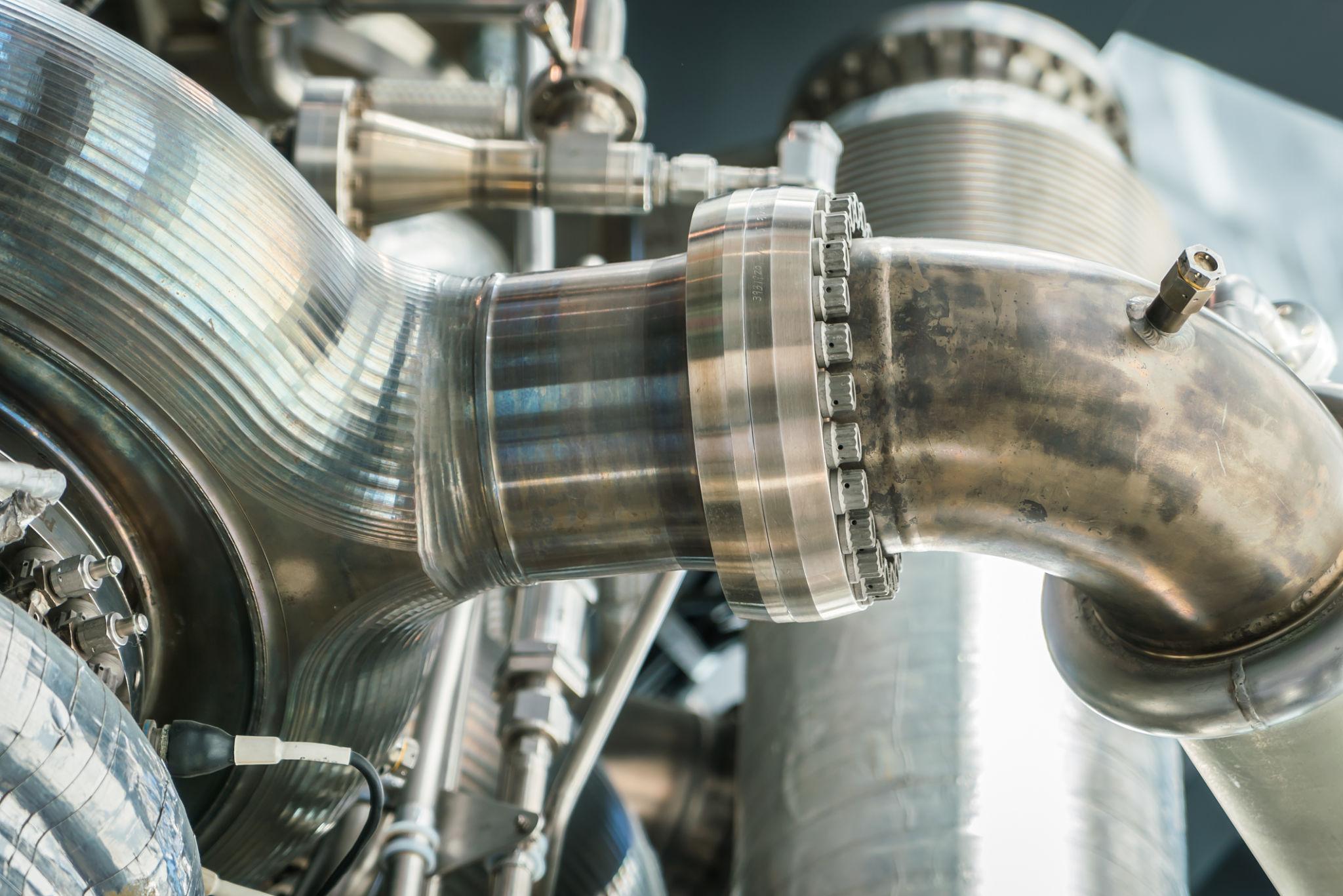 Machined fittings on a fluid system tubing run